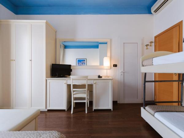 Hotel Fra I Pini : photo 2 de la chambre chambre quadruple confort