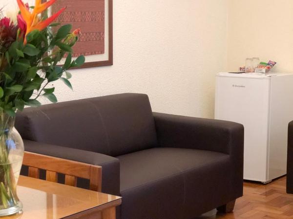 Hotel Rojas All Suite : photo 3 de la chambre suite principale lit king-size