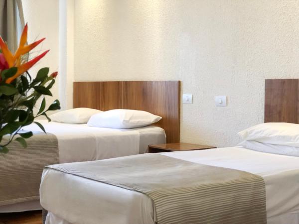Hotel Rojas All Suite : photo 8 de la chambre suite premium avec 1 lit king-size et 1 lit simple