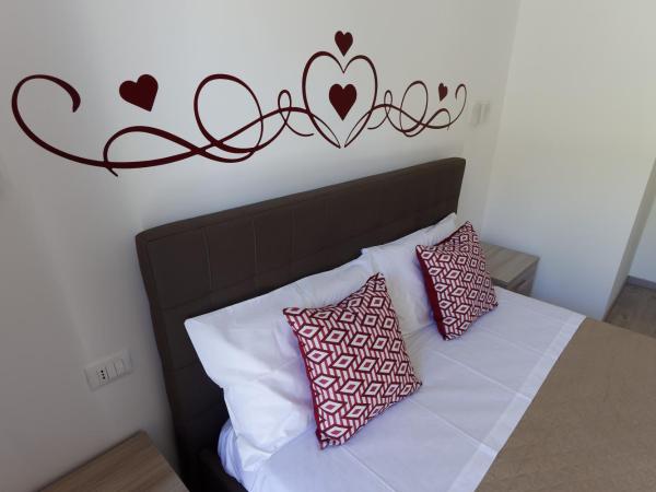 Le Coccole : photo 5 de la chambre chambre double deluxe avec balcon