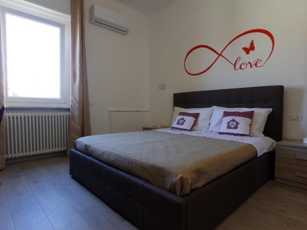 Le Coccole : photo 2 de la chambre chambre double