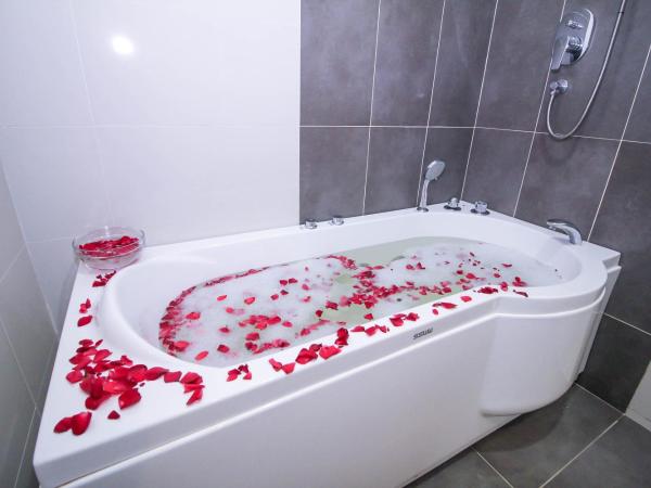 Asia Like Boutique Hotel : photo 10 de la chambre suite familiale avec bain à remous