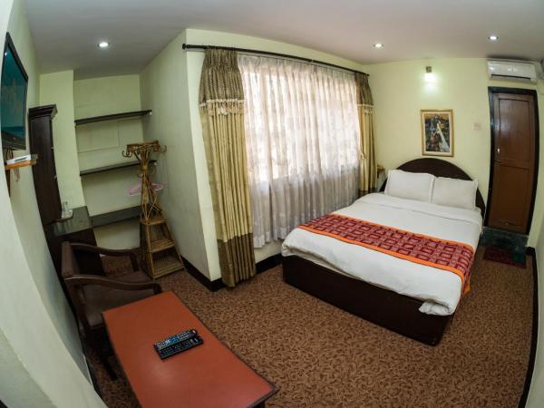 Hotel Encounter Nepal & Spa : photo 4 de la chambre standard double room - 15% off on food and beverage, 15% off spa, 24 hour check in and free welcome drink