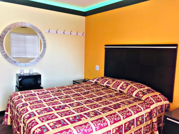 Central Inn Motel : photo 5 de la chambre chambre supérieure lit queen-size