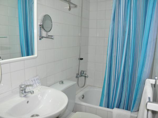 Hostal - Pensión El Amigo : photo 2 de la chambre chambre triple avec balcon