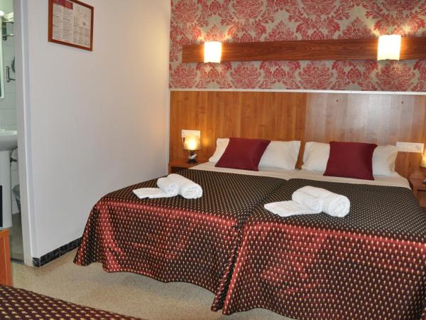 Hostal - Pensión El Amigo : photo 2 de la chambre chambre triple standard