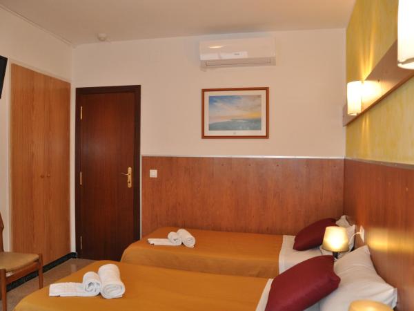 Hostal - Pensión El Amigo : photo 3 de la chambre chambre triple standard