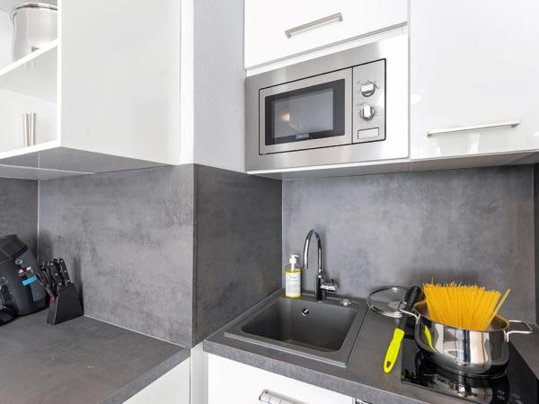 centerroom München City : photo 1 de la chambre chambre double supérieure avec toit-terrasse et cuisine