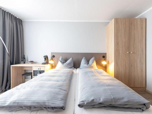 centerroom München City : photo 7 de la chambre chambre double avec balcon et cuisine