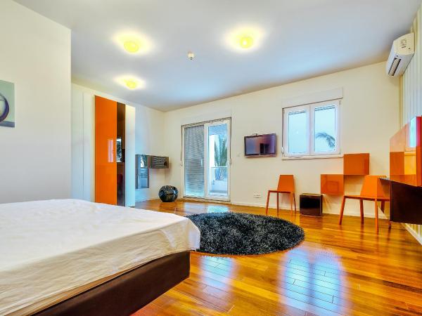 Perla Resort : photo 2 de la chambre chambre triple de luxe avec balcon et vue sur la mer