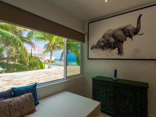 Lotus Beach Hotel - Adults Only : photo 7 de la chambre suite avec bain à remous - vue partielle sur océan