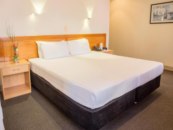 President Hotel Auckland : photo 1 de la chambre studio standard avec lit king-size