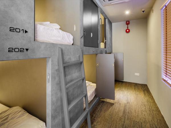 Circular House : photo 2 de la chambre capsule lit king-size dans dortoir mixte