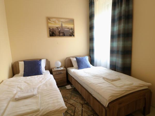 Classic Apartman : photo 7 de la chambre chambre lits jumeaux standard