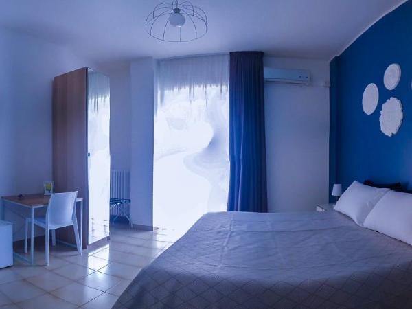 Melo Accommodations : photo 9 de la chambre chambre quadruple avec balcon