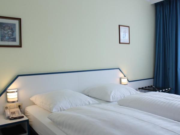 Hotel City Kräme am Römer - Self Check In : photo 4 de la chambre chambre lits jumeaux standard