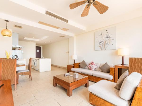 Aegean Suites Sanya Yalong Bay Resort : photo 1 de la chambre suite 2 chambres avec cuisine, ustensiles et lave-linge/sèche-linge - vue sur jardin