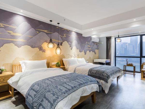 Chongqing Ouranjian Lake View Guesthouse : photo 6 de la chambre chambre lits jumeaux avec vue