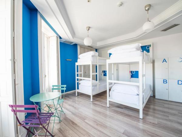 Safestay Madrid Central : photo 1 de la chambre lit dans dortoir mixte de 4 lits avec salle de bains privative