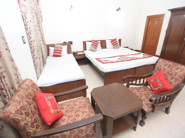 YMCA SEACOM INN : photo 1 de la chambre chambre triple Économique