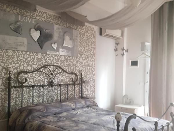 Casale D' Or : photo 10 de la chambre chambre triple avec balcon et salle de bains privative séparée