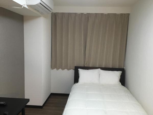 TIMES INN 3F : photo 1 de la chambre chambre double standard avec salle de bains commune