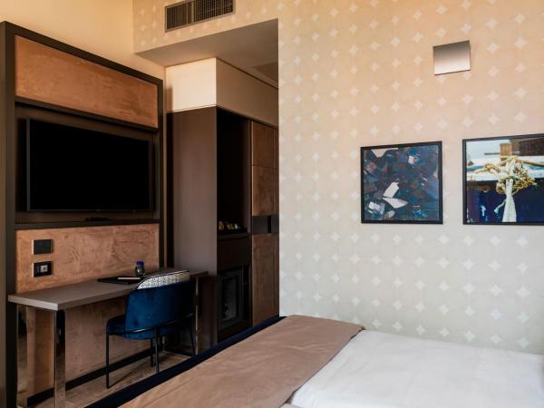 Amadomus Luxury Suites : photo 2 de la chambre chambre double supérieure