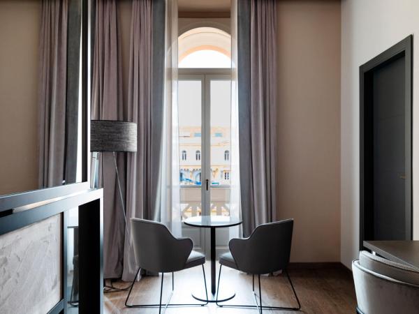 Amadomus Luxury Suites : photo 2 de la chambre suite junior