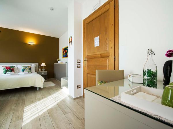 B&B Pousada Rio Aosta-servizi di Bed and breakfast : photo 9 de la chambre chambre double - vue sur jardin