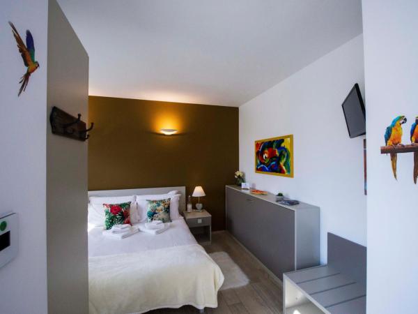 B&B Pousada Rio Aosta-servizi di Bed and breakfast : photo 8 de la chambre chambre double - vue sur jardin