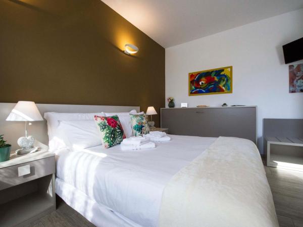 B&B Pousada Rio Aosta-servizi di Bed and breakfast : photo 7 de la chambre chambre double - vue sur jardin