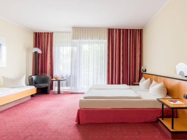 Andante Hotel Dresden : photo 1 de la chambre chambre triple avec balcon