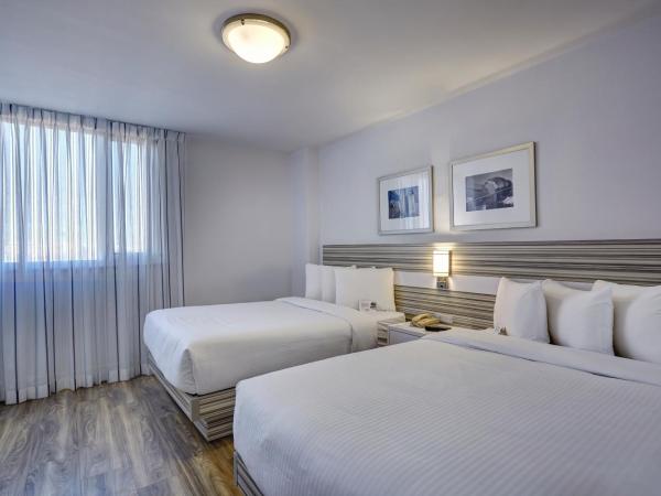 Town Inn Suites Hotel : photo 4 de la chambre chambre deluxe avec 2 lits doubles