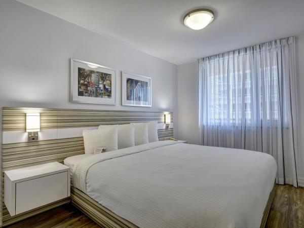 Town Inn Suites Hotel : photo 4 de la chambre suite deluxe avec lit king-size