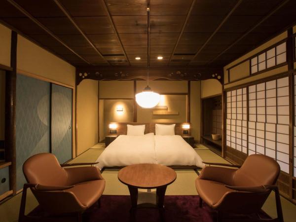 Sowaka : photo 2 de la chambre chambre lits jumeaux deluxe hollywood avec jardin privé (bâtiment principal)