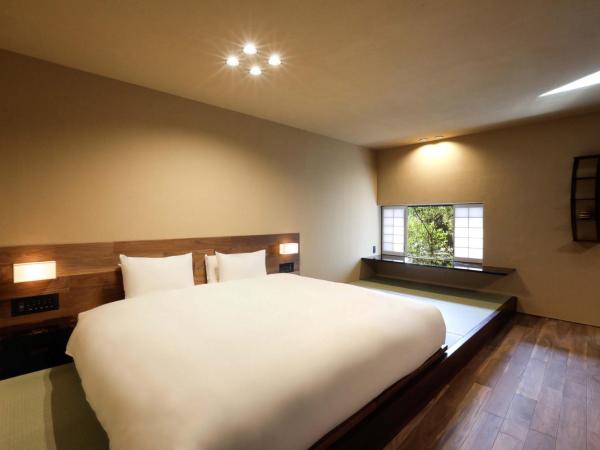 Sowaka : photo 1 de la chambre chambre lit king-size deluxe avec coin tatami - vue sur cour (annexe)