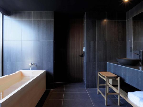 Sowaka : photo 2 de la chambre chambre lit king-size supérieure - vue sur ville (annexe)