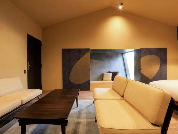 Sowaka : photo 1 de la chambre grande chambre lit king-size deluxe - vue sur cour (annexe)