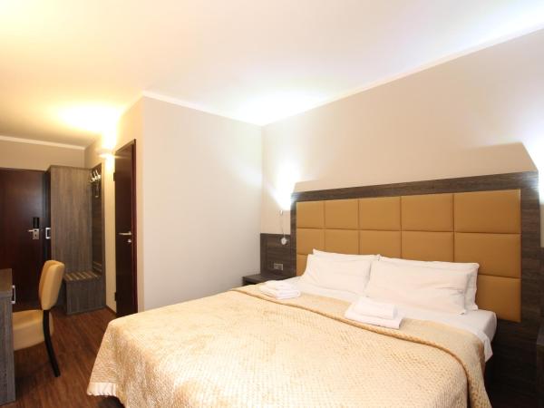 Hotel Delta am Potsdamer Platz : photo 4 de la chambre chambre familiale