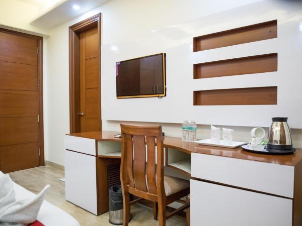 SM Palace (Near Apollo Hospital) : photo 4 de la chambre chambre lit king-size