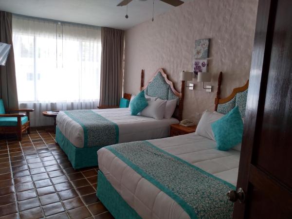 Hotel Posada Quinta Las Flores : photo 4 de la chambre suite double junior
