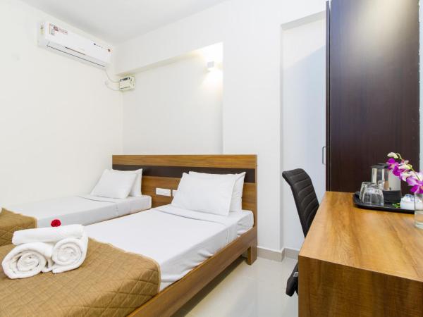 Sanctum Suites Whitefield Bangalore : photo 2 de la chambre chambre lits jumeaux deluxe