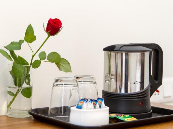 Sanctum Suites Whitefield Bangalore : photo 7 de la chambre chambre lit queen-size deluxe