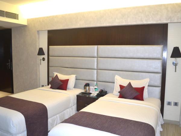 Southern Plaza : photo 3 de la chambre chambre deluxe double ou lits jumeaux