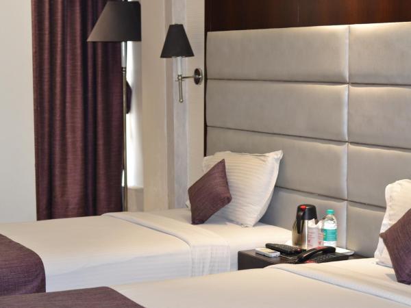 Southern Plaza : photo 5 de la chambre chambre deluxe double ou lits jumeaux