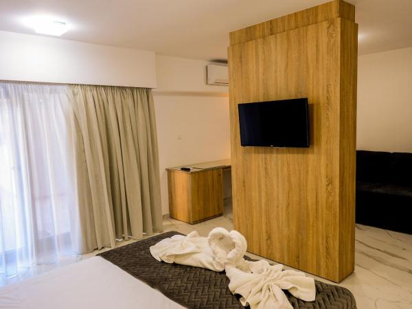 Island Dreams Rooms & Suites : photo 1 de la chambre suite familiale