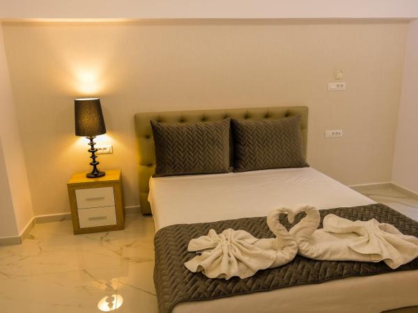 Island Dreams Rooms & Suites : photo 1 de la chambre chambre double ou lits jumeaux standard