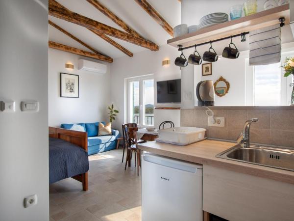 Amore fortina : photo 2 de la chambre studio - vue sur mer