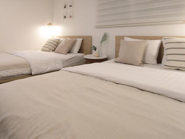 Neat House : photo 3 de la chambre chambre deluxe avec 2 lits queen-size