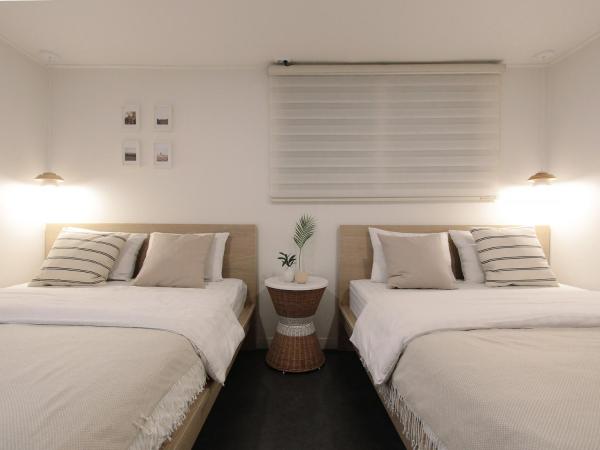 Neat House : photo 1 de la chambre chambre deluxe avec 2 lits queen-size